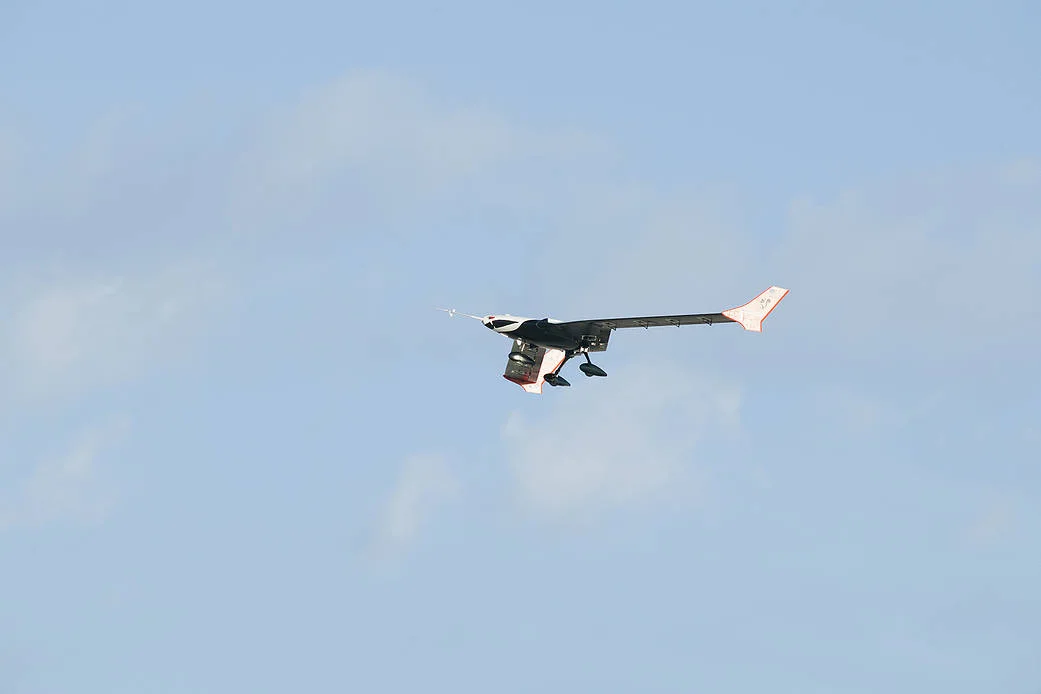 NASA X-56A research aircraft climbing in a clear sky
